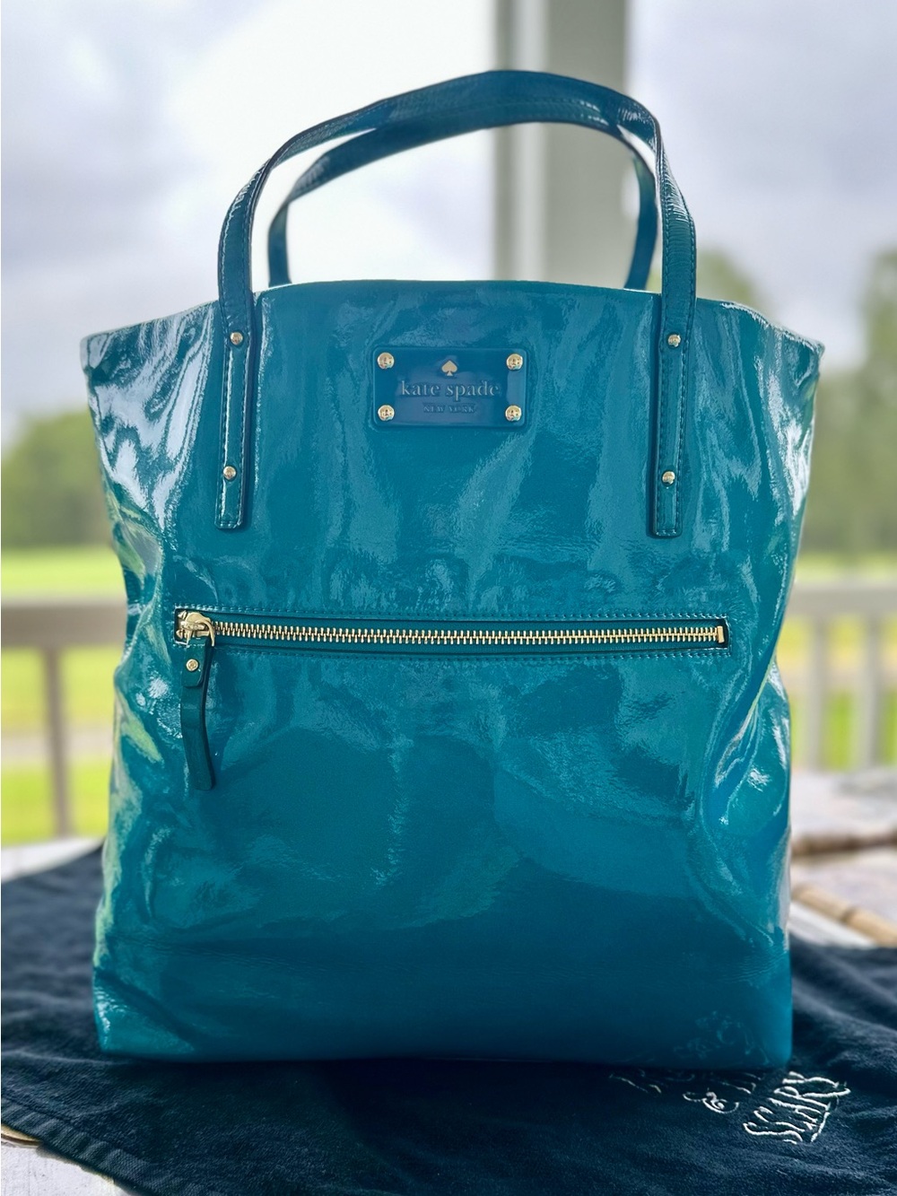 kate spade glossy teal patent tote with gold-tone zipper